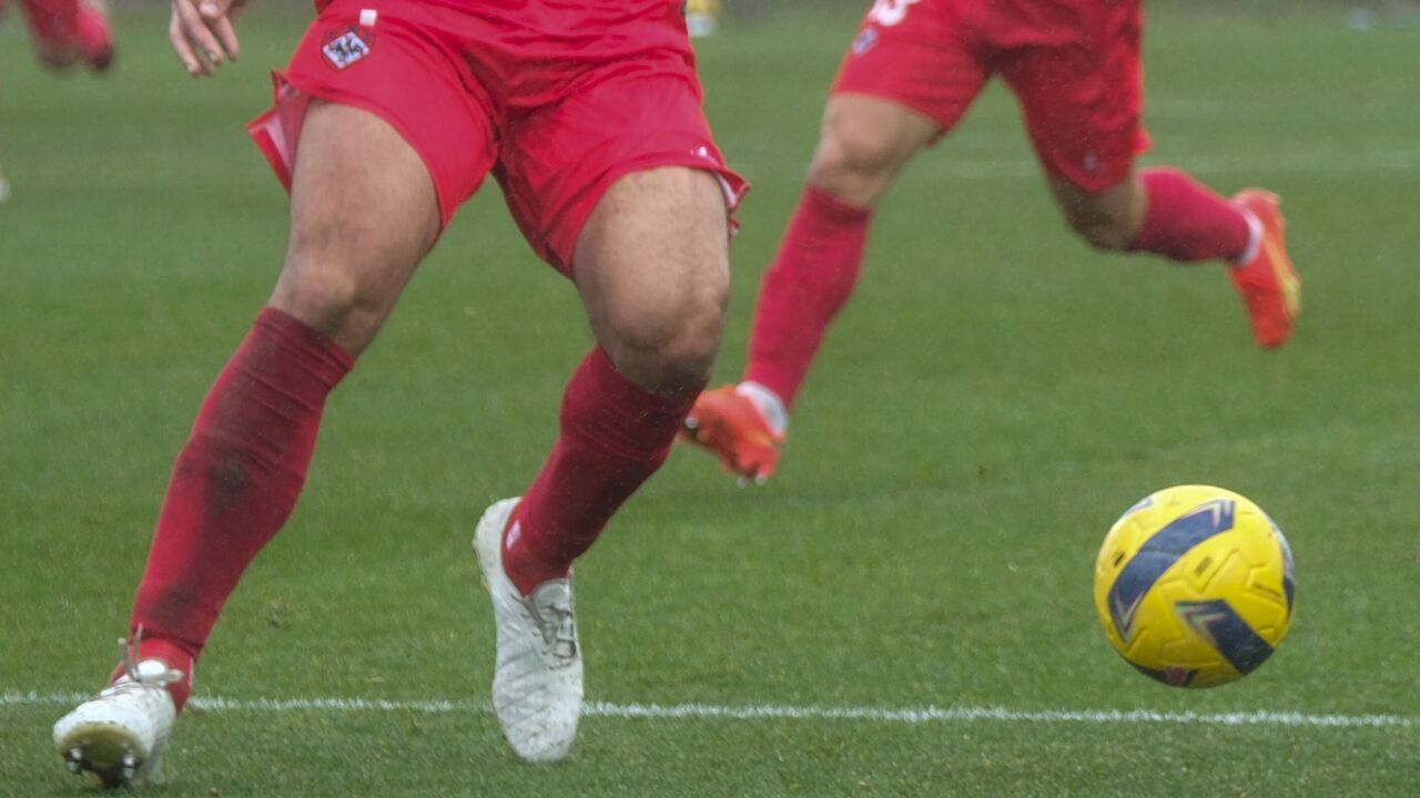 Jogadores da Oliveirense em campo durante jogo