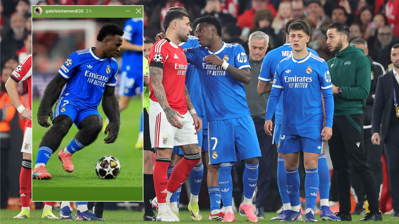 Otamendi e Vinícius Júnior conversam durante o Benfica-Real Madrid, na Luz