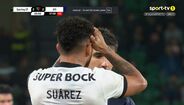 Suárez envolvido em lance com Baroan, que fraturou o pé em Alvalade