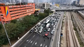 Ativistas bloqueiam autoestrada em Telavive em protesto