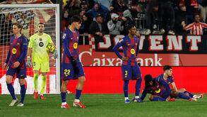 Jogadores do Barcelona desolados 