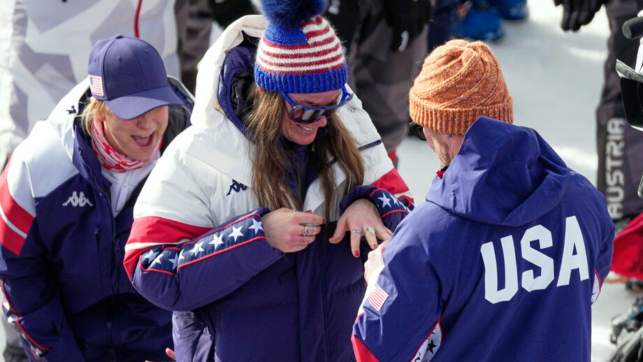 Atletas dos EUA juntos num evento desportivo