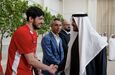Sardar Azmoun tramado por foto com Mohammed bin Rashid Al Maktoum