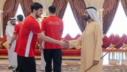 Sardar Azmoun tramado por foto com Mohammed bin Rashid Al Maktoum