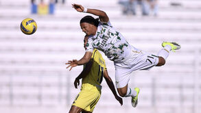 Os jogadores de Moreirense e Nacional em ação