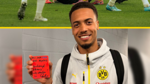 Nmecha com o cartão vermelho autografado