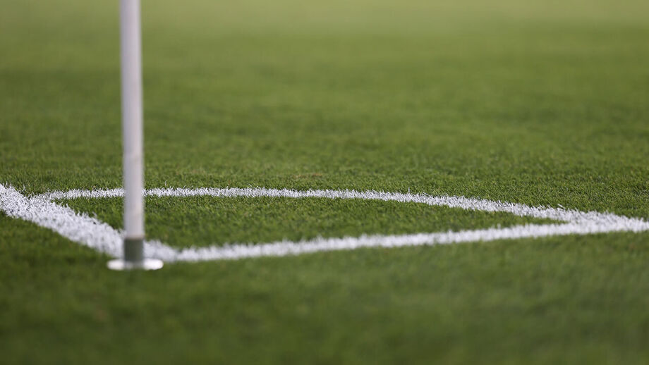 Canto em campo de futebol 
