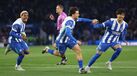 Jogadores do Brighton celebram um golo no jogo contra o Chelsea