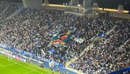 Claques do FC Porto exibiram tarja com Varandas mascarado de palhaço durante o clássico no Dragão