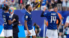 Mbappé festeja frente à Suécia