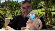 Sérgio Conceição e o neto, filho de Rodrigo Conceição