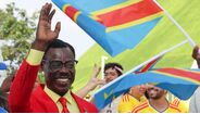 Adepto do Congo na entrada pra o estádio
