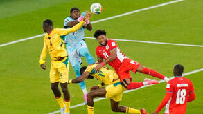 Os jogadores de Gana e Panamá em ação