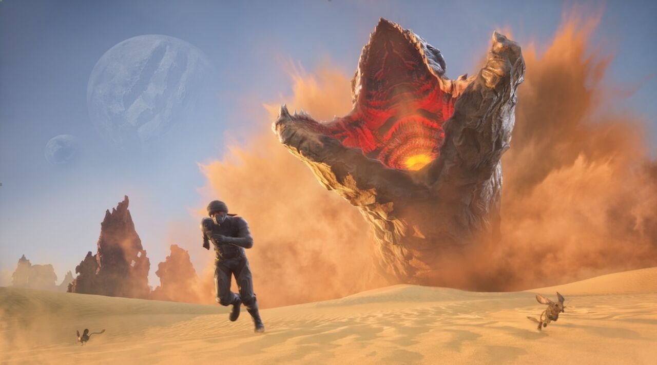 Um homem foge de um verme da areia em Dune: Awakening