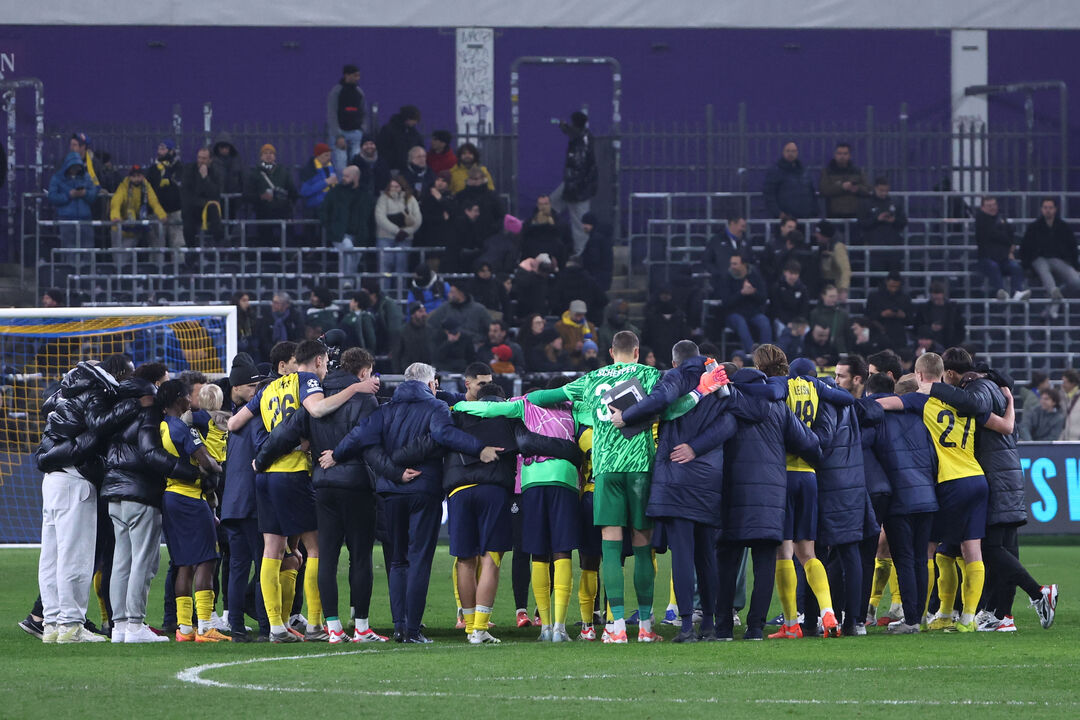 Union SG's players celebrate at the end of the Champions League opening phase soccer match between Union Saint-Gilloise and Atalanta,