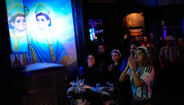 Imagem de Maradona num bar em Buenos Aires