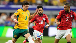 Os jogadores de Austrália e Egito em ação