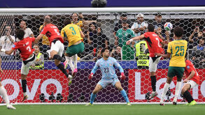 Os jogadores de Austrália e Egito em ação