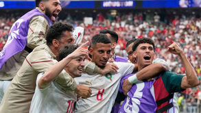 Jogadores de Marrocos fazem a festa frente ao Canadá