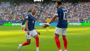 Olise e Mbappé 