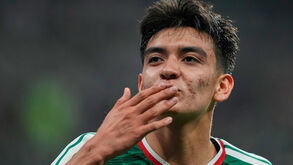 Mexico's Gilberto Mora (19) gestures to fans as he leaves the field during the World Cup round of 32 soccer