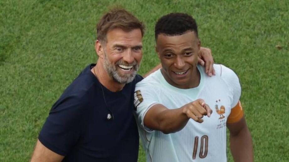 Klopp com Mbappé após o França-Marrocos