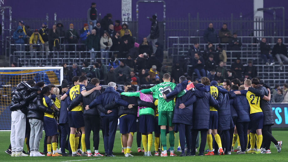 Union SG's players celebrate at the end of the Champions League opening phase soccer match between Union Saint-Gilloise and Atalanta,