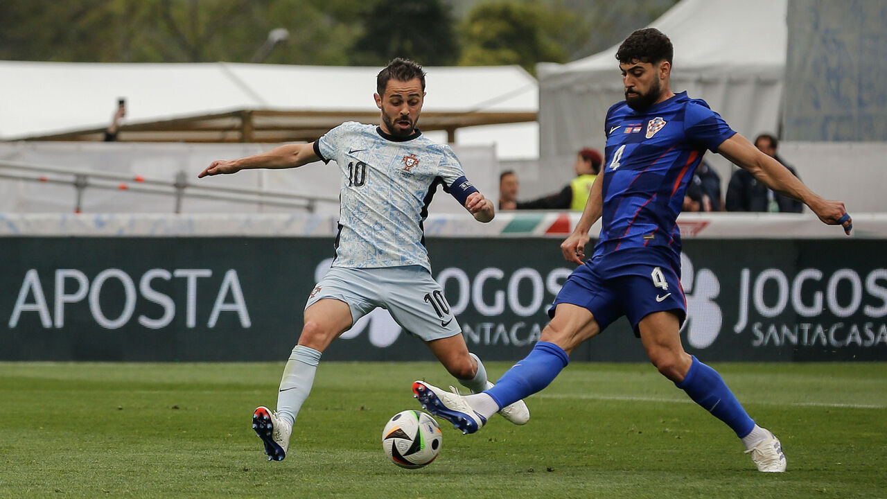 Gvardiol e Bernardo Silva, aqui como adversários nas respetivas seleções