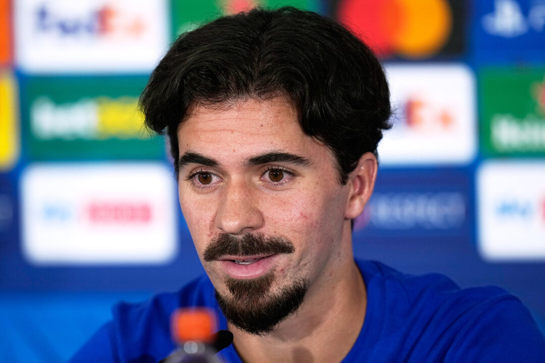 PSG's Vitinha speaks during a press conference ahead of the UEFA Super Cup soccer match between Paris Saint-Germain and Aston
