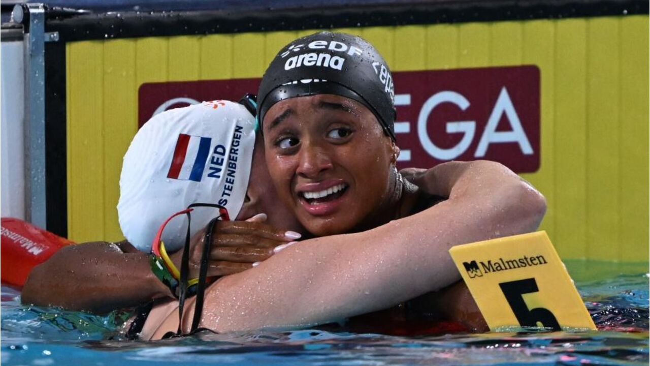 Italy's Sara Curtis reacts after beraking the world record during