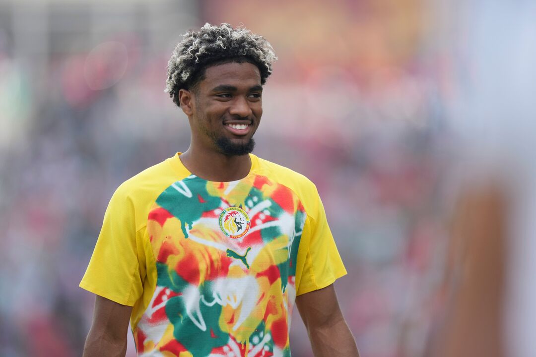 Senegal's Ibrahim Mbaye (20) warms up ahead of the World Cup Group I soccer match between Senegal and Iraq in