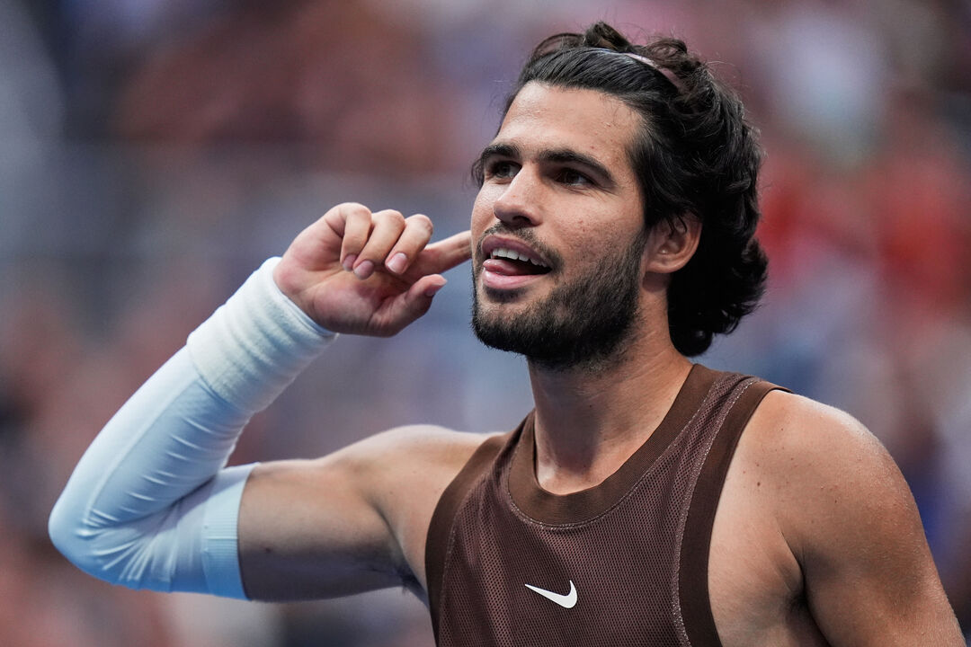 Carlos Alcaraz, of Spain, celebrates winning a match against Roman Safiullin, of Russia, during the first round of the U.S.