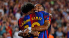 Lamine Yamal e Raphinha festejam durante o Barcelona-Rayo Vallecano