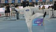 Robô a fazer Tai Chi no World Humanoid Robot Games