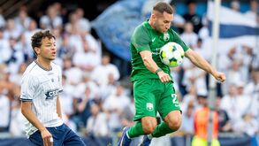 Sabah's Velko Simic controls the ball next to Aarhus' Mikael Anderson during the UEFA Champions League 3rd qualifying round 1st