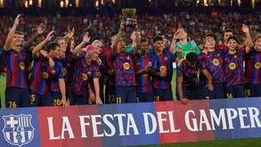 Barcelona players celebrate with the trophy after defeating Al Ahly
