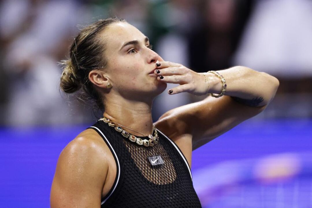 Aryna Sabalenka, of Belarus, celebrates winning a match against Polina