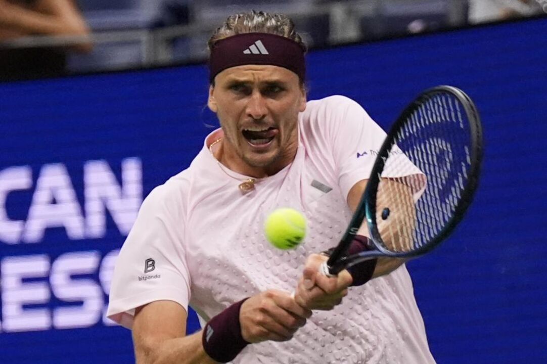 Alexander Zverev, of Germany, hits a return during the fifth