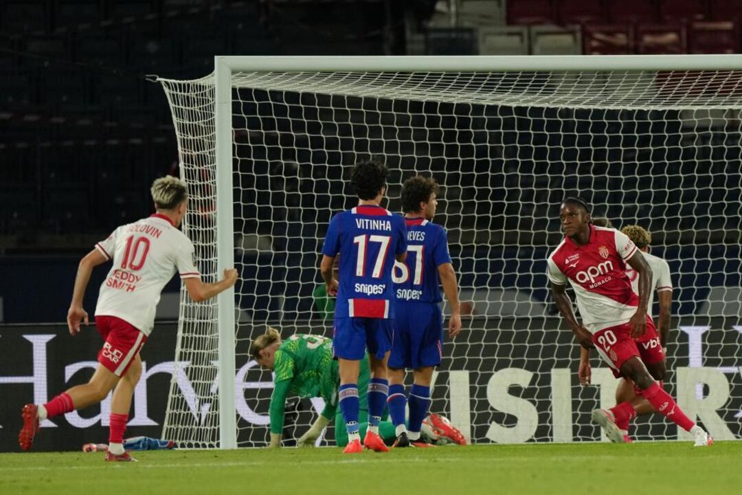 Monaco's Flavio Nazinho, right, celebrates after scoring his side's first