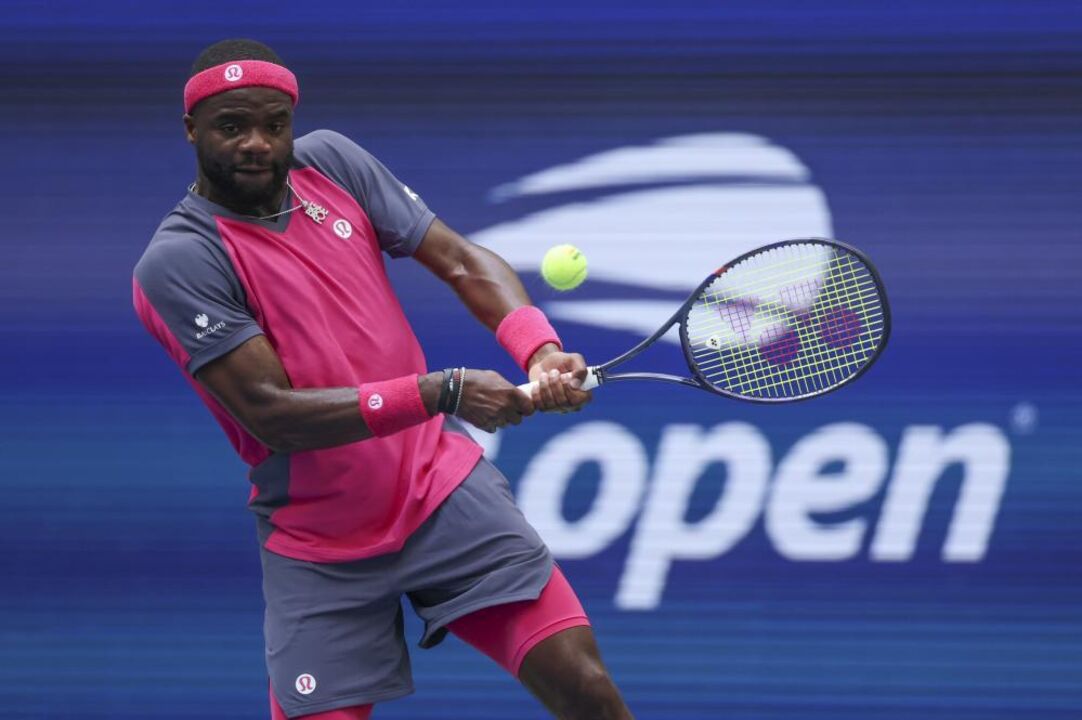 Frances Tiafoe of the US in action against Alex Michelsen
