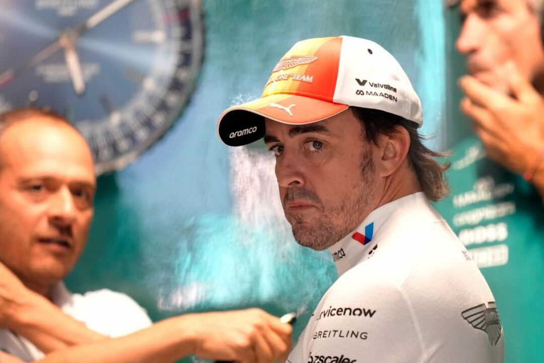 Aston Martin driver Fernando Alonso of Spain prepares for the