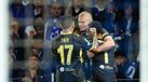 Manchester City's Erling Haaland, center, celebrates after scoring his side's