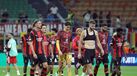 Jogadores do Milan após a derrota com o Benfica