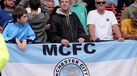 Noel Gallagher nas bancadas a e ver o Manchester City 