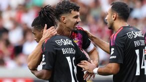 Benfica player Leandro Barreiro (L) celebrates with teammates after scoring