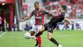 Marítimo player Igor Julião (L) in action against Benfica player