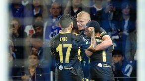 Manchester City's Erling Haaland, center, celebrates after scoring his side's