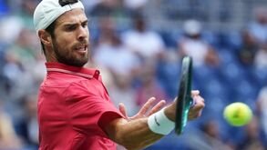 Karen Khachanov, of Russia, returns the ball to Alexander Blockx,
