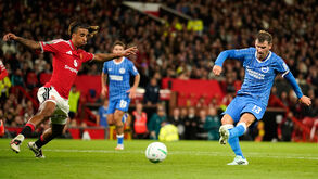 Brighton's Pascal Gross, right, scores his side's second goal during the English League Cup third round soccer match between Manchester