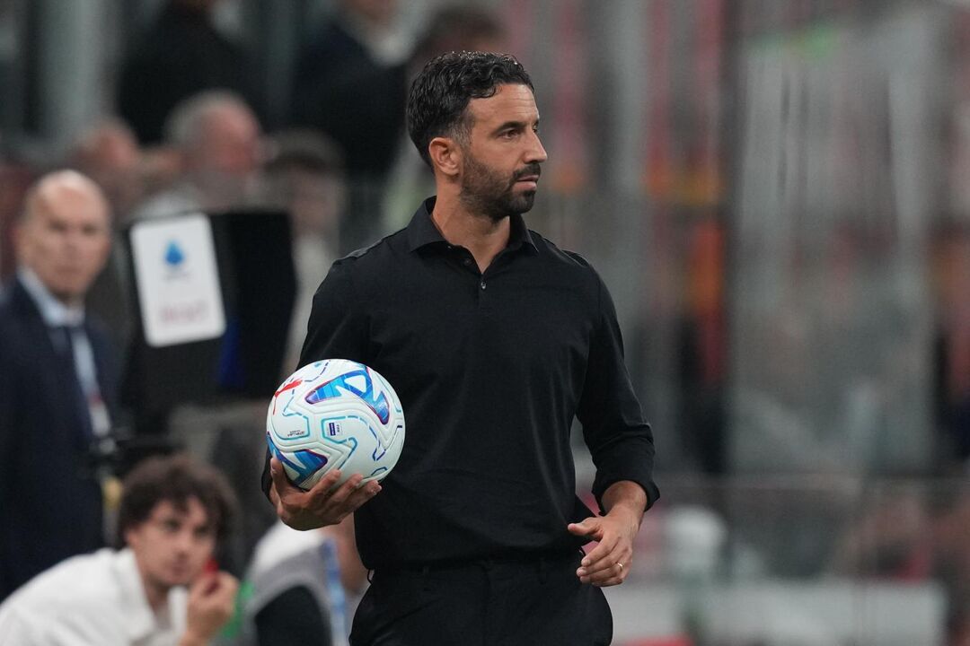 AC Milan's head coach Ruben Amorim holds the ball during